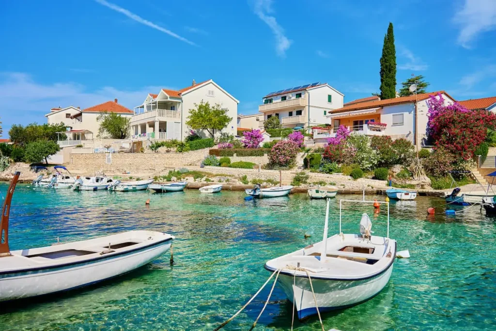 boats-docked-near-beautiful-houses