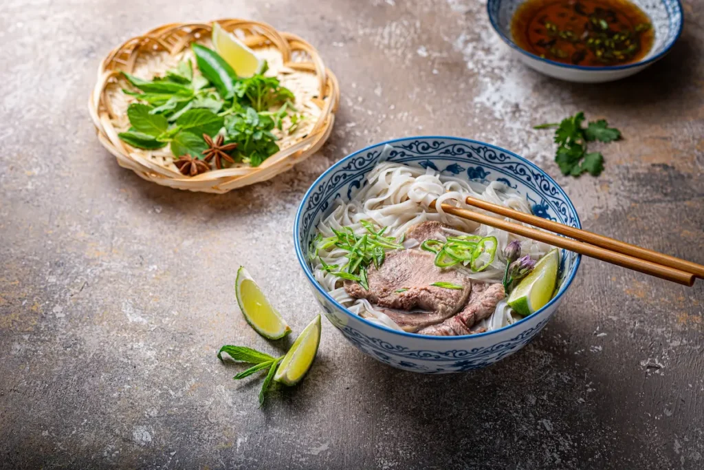 delicious-vietnamese-pho-bowl-with-herbs-and-lime-2026-01-05-01-24-04-utc