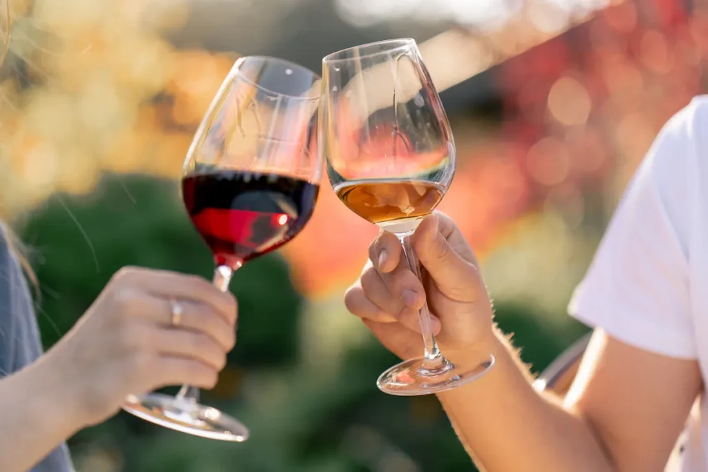 hands-holding-glasses-of-different-types-of-wine