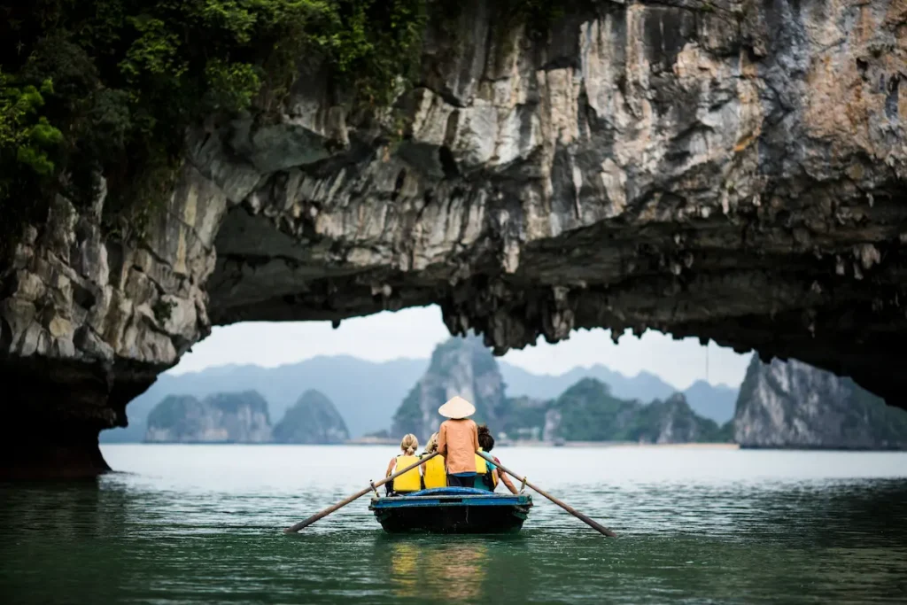 rear-view-of-man-wearing-straw-hat-transporting