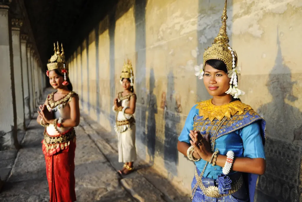 women-in-traditional-dress-at-stone-angkor-wat