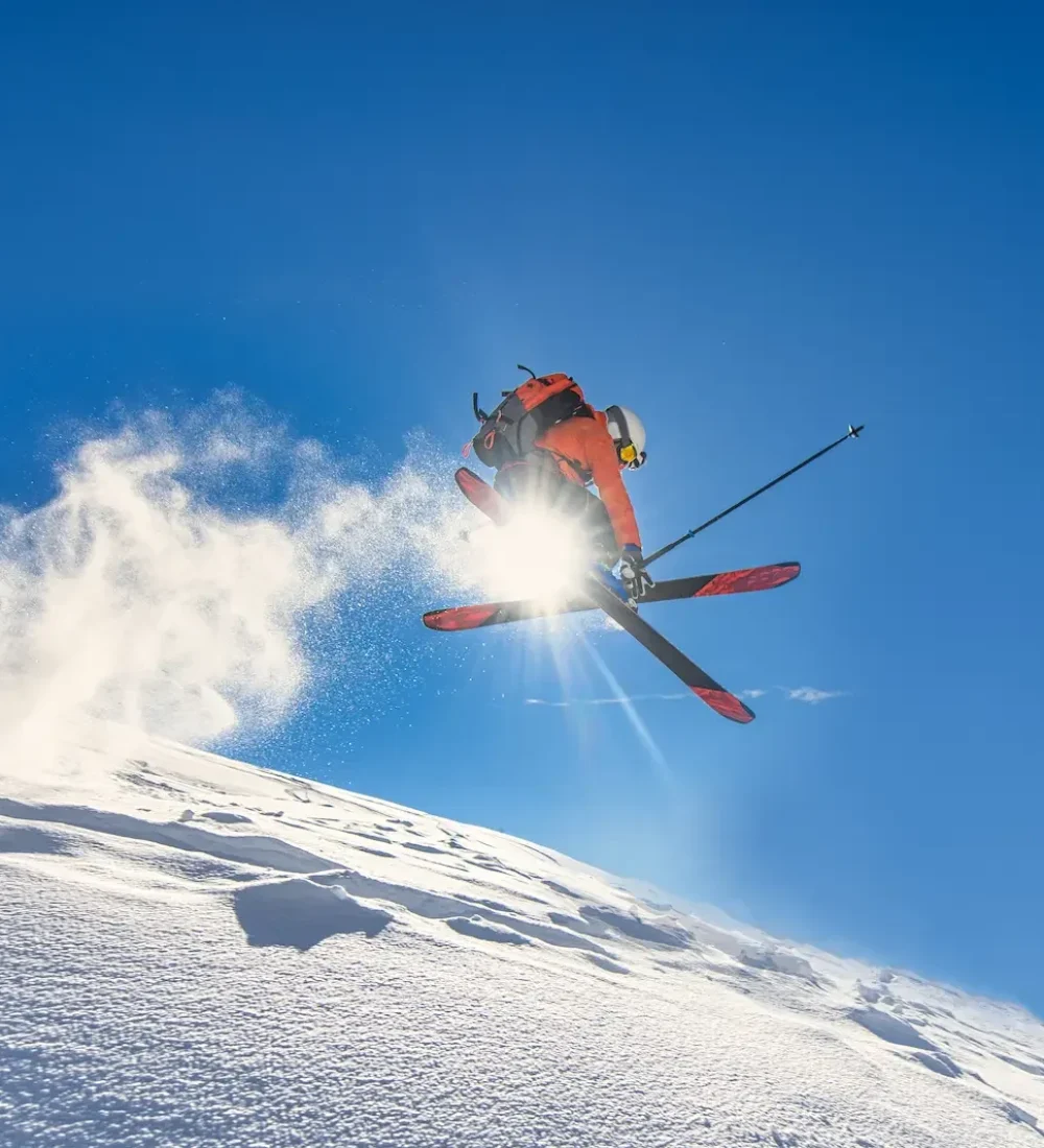 skier-soaring-through-blue-sky-on-winter-day-2026-01-09-00-44-53-utc